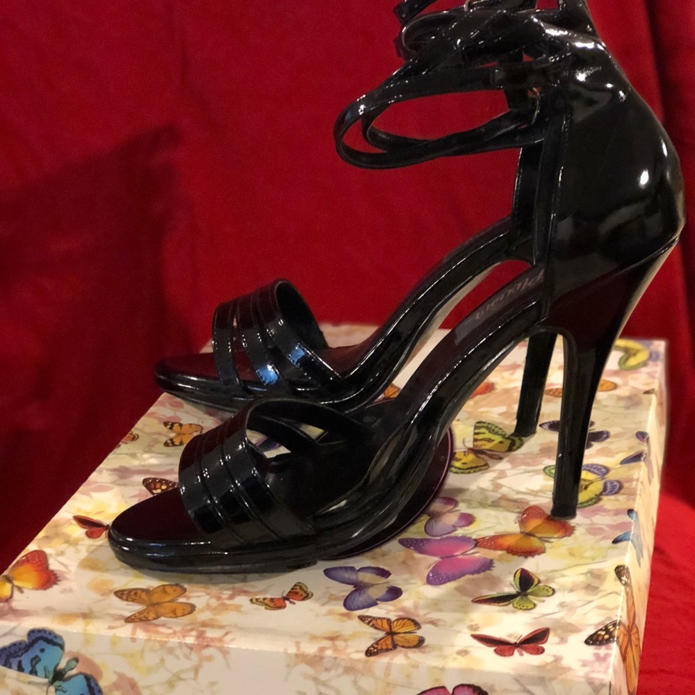 High heel black satin ankle strapped shoes